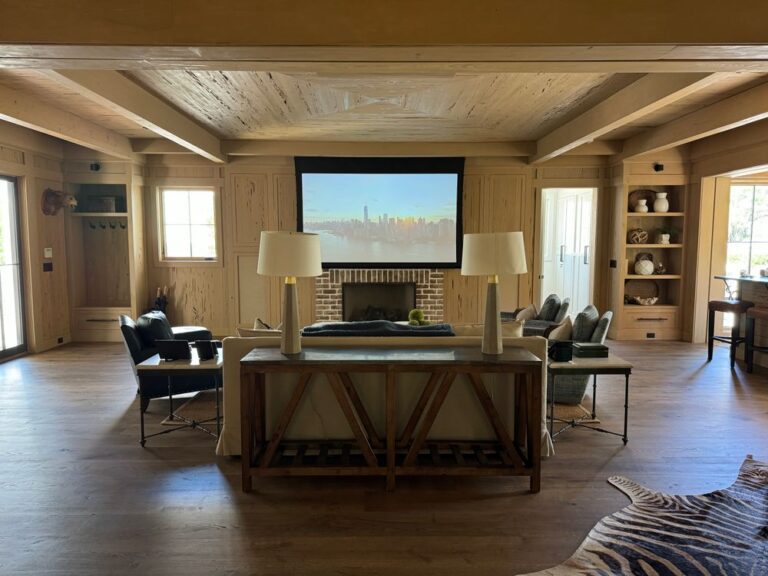 Living room home theater with projector screen